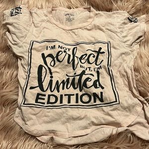 This a regular front cut top with words